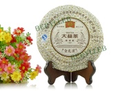 Menghai  Dayi 2009  "golden peacock" from Menghai Tea Factory (berylleb on ebay)