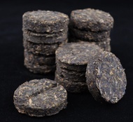 2004 Bamboo Coin Raw Pu-erh Tea of Dehong from Yunnan Sourcing