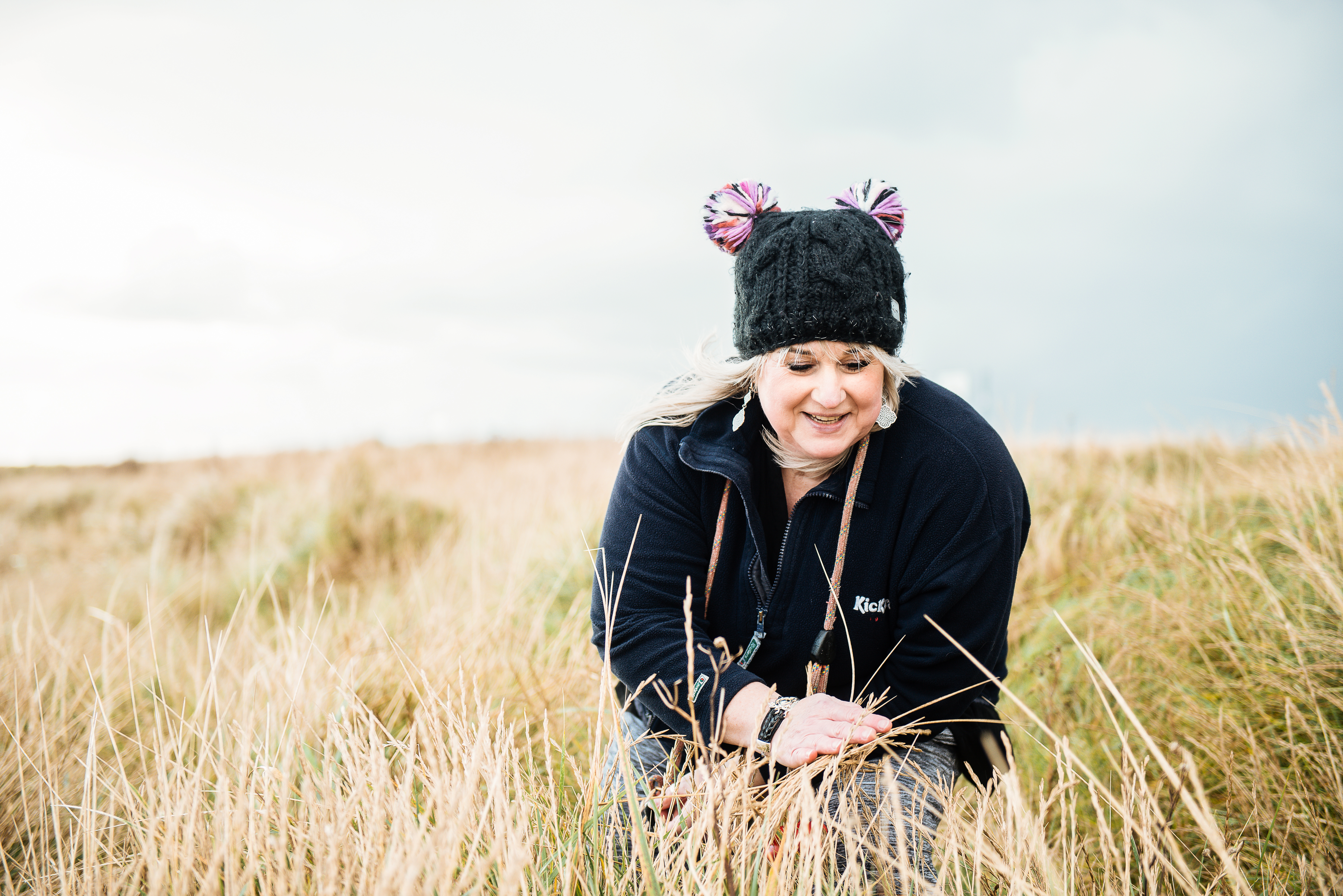 picture of a woman at the beach in the winter