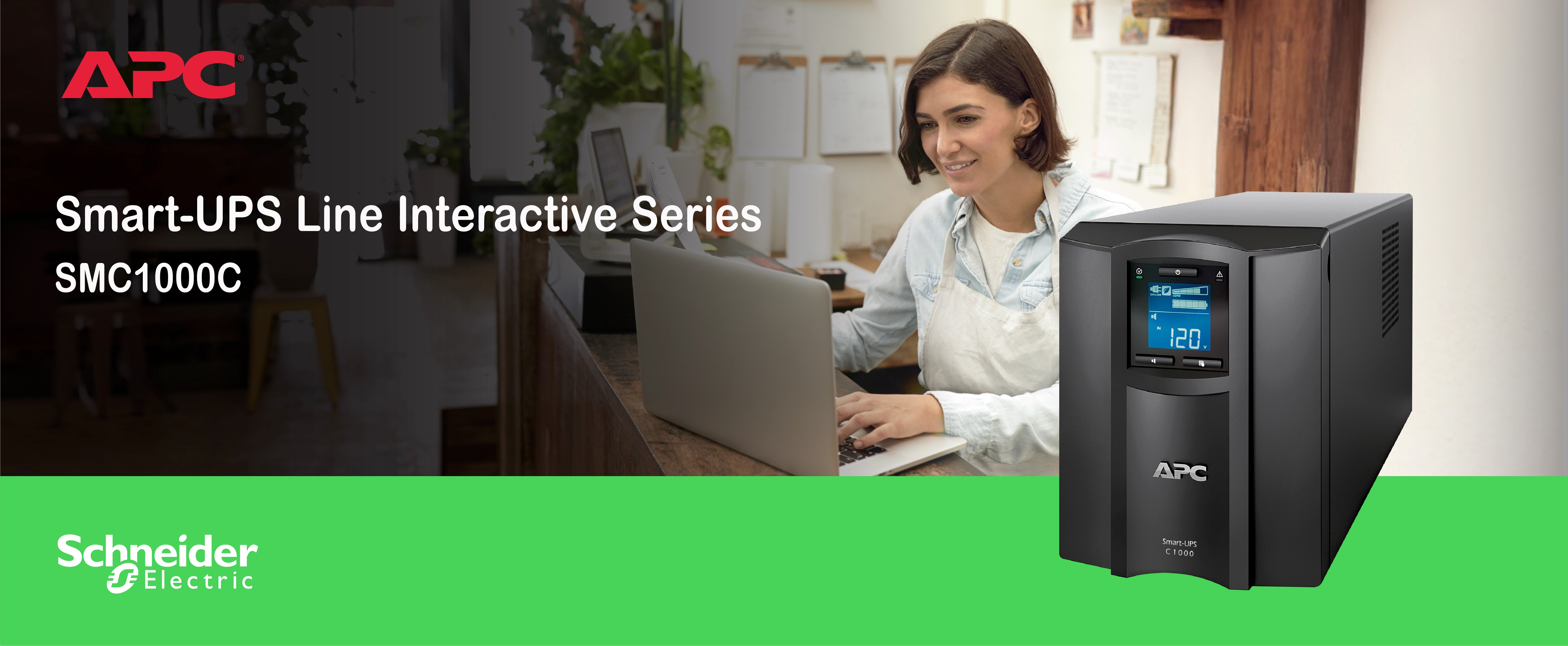 APC Smart-UPS with a woman in a retail setup in the background