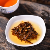 2018 "Drunk on Red with Osmanthus Flower" Sun-Dried Black Tea Cake from Yunnan Sourcing