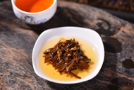 2018 "Drunk on Red with Osmanthus Flower" Sun-Dried Black Tea Cake from Yunnan Sourcing