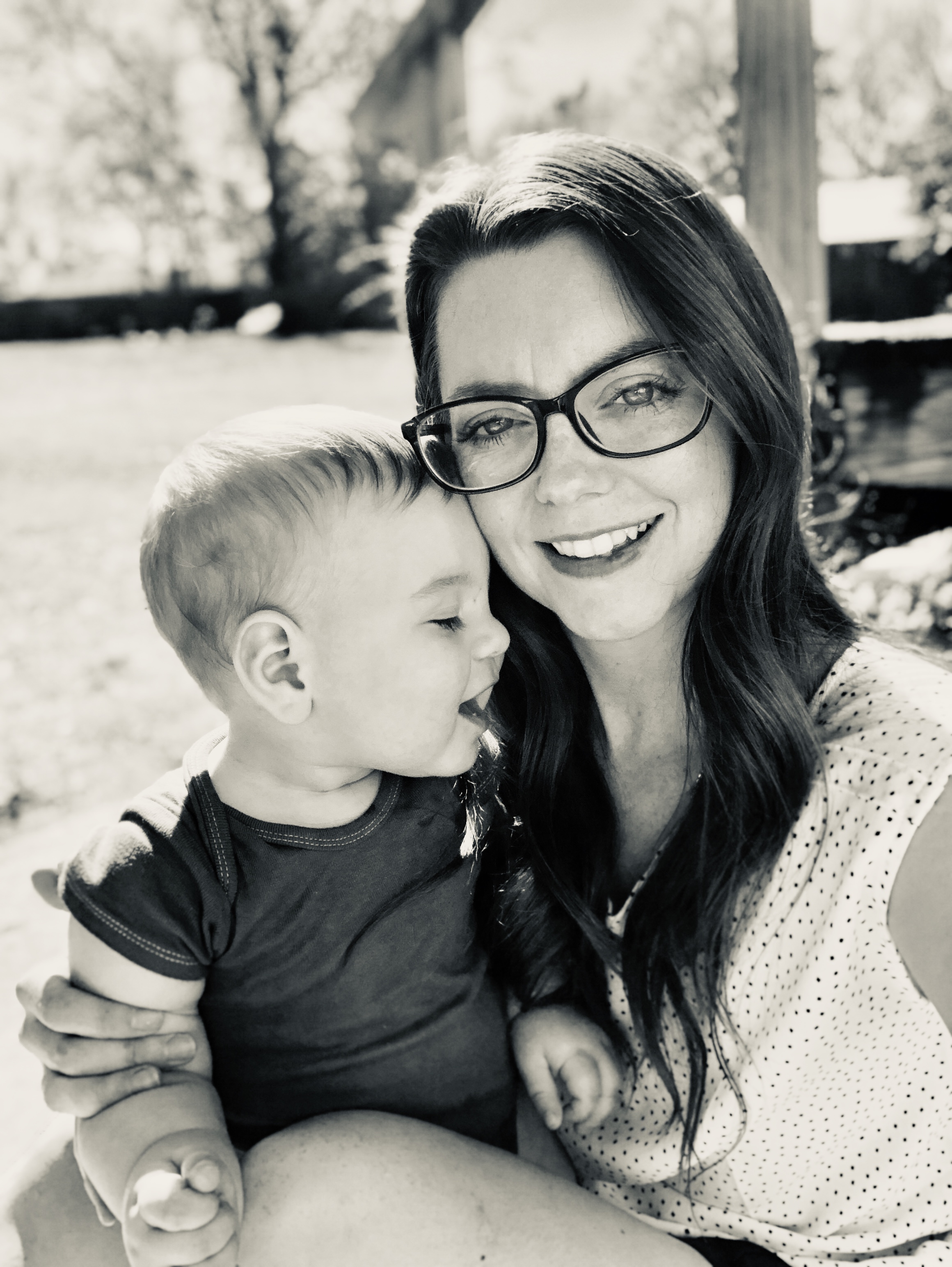 Kimberly (instructor) holding baby