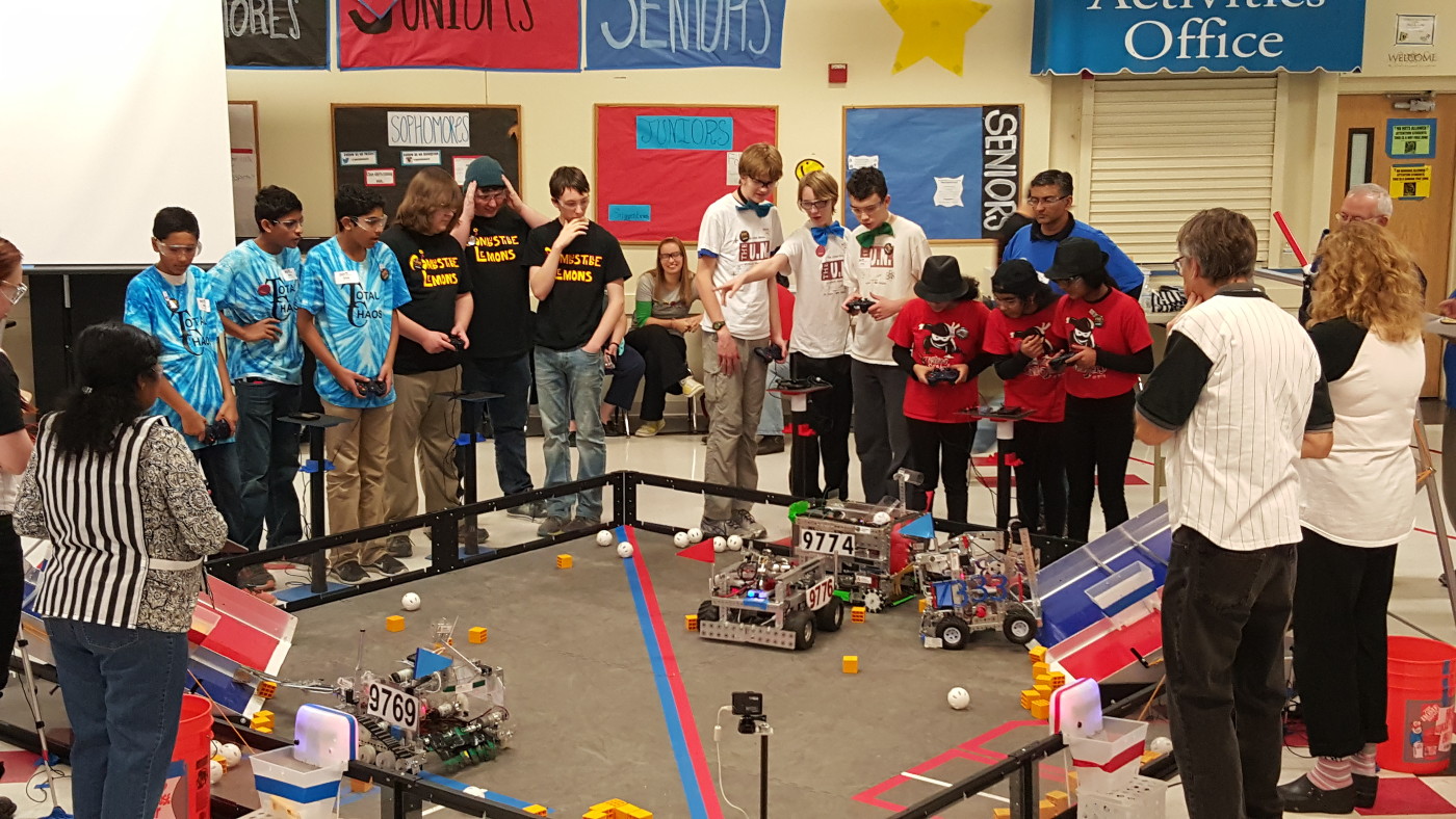 The Nano Ninjas robot in action, competing in an alliance against two other allied teams