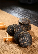 Jinggu Aged Raw Pu-erh Tea Mini Cake from Yunnan Sourcing