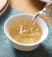 2010 Liming "Bu Lang Mouantain Red Mark" Raw Pu-erh Tea Cake from Yunnan Sourcing