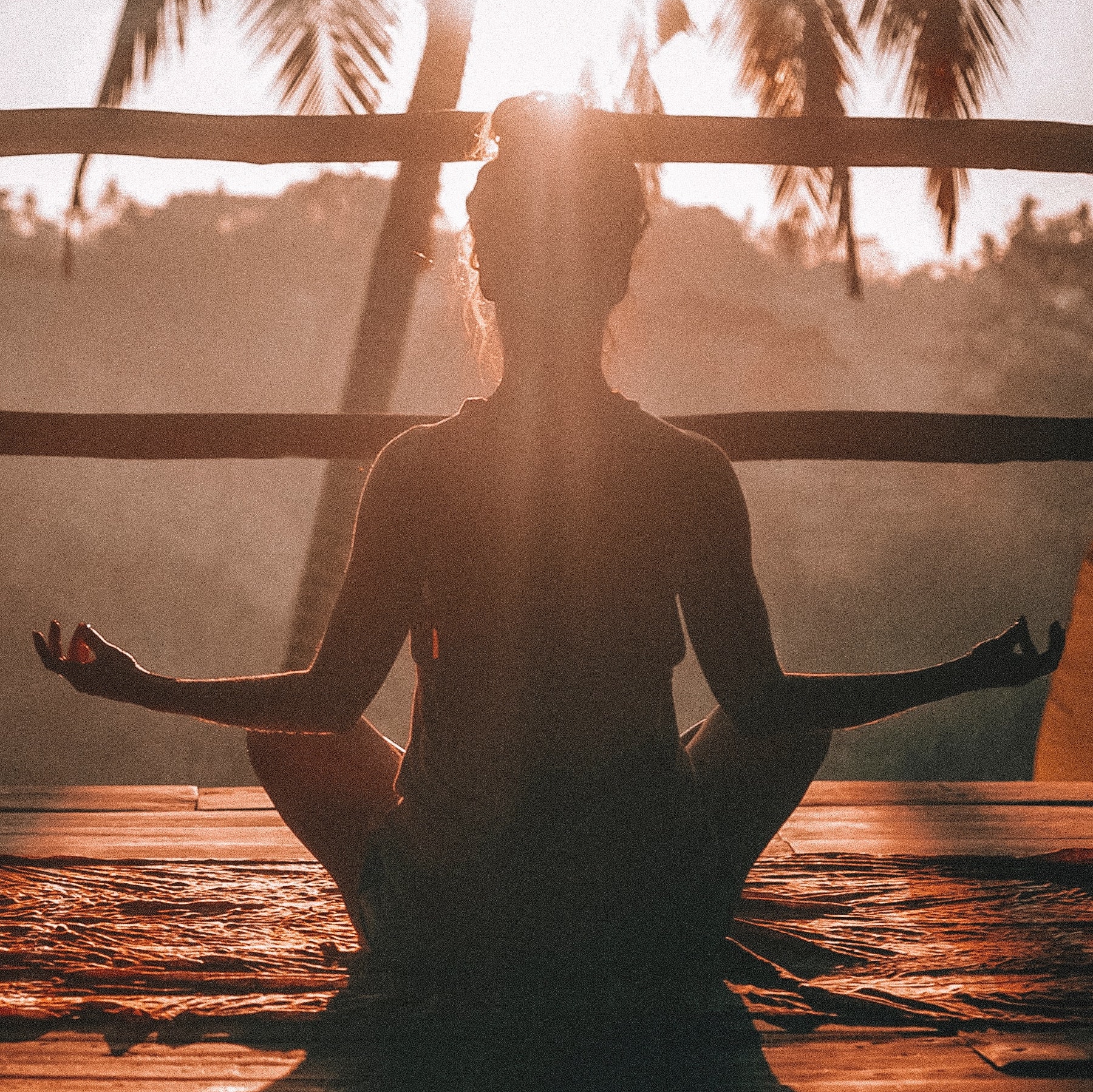 Woman meditating in the sunshine