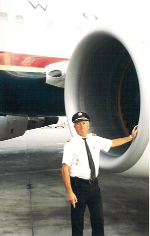 Walt standing next to a 747