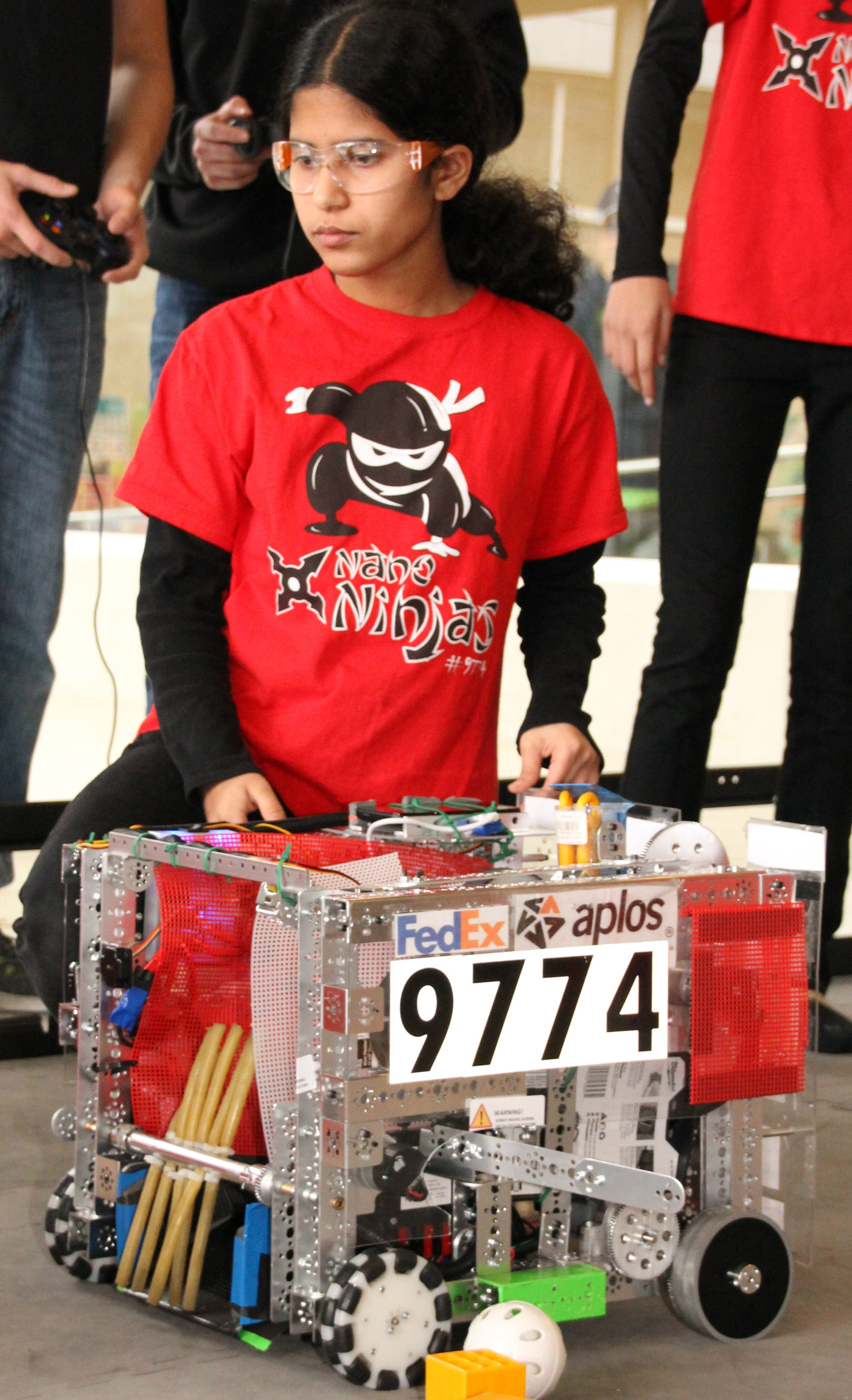 The Nano Ninjas demo their robot during the qualifier!