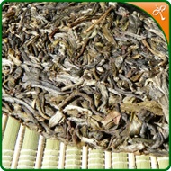 Sheng Pu Er Qi Zi Bing 'Mang Fei Mountain' - 2009 from Wan Ling Tea House
