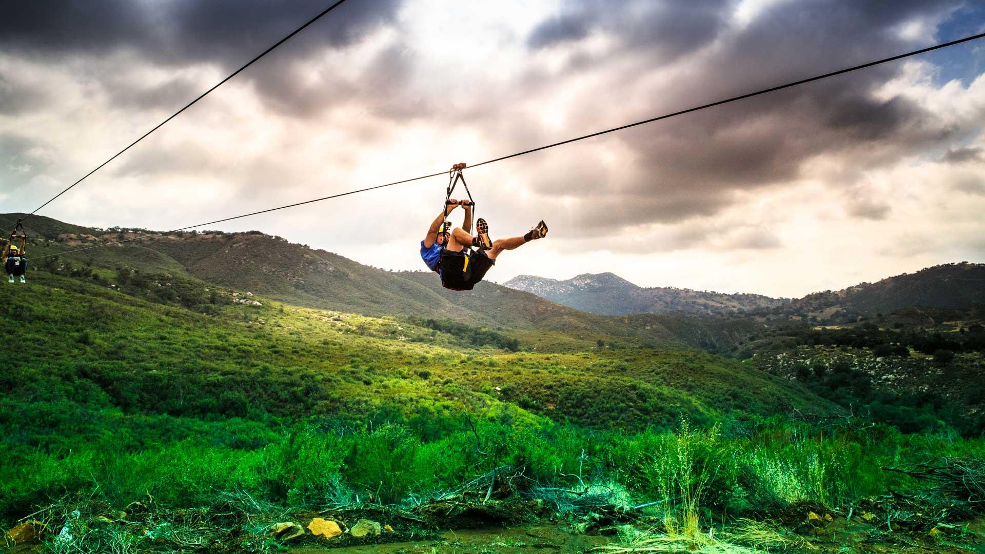 Experience an exhilarating adventure with La Jolla Zip Zoom's Zipline Tour in Pauma Valley, California. This guided tour offers thrill-seekers an opportunity to soar over scenic landscapes and lush forests, providing unforgettable views and an adrenaline rush. Perfect for outdoor enthusiasts, the zipline tour combines nature, adventure, and a touch of adrenaline-fueled fun. As you glide from platform to platform, you'll enjoy panoramic vistas of California's countryside, making it an ideal activity for families, friends, or solo explorers. Safety is a top priority, with experienced guides ensuring a smooth and secure experience from start to finish. The tour not only offers adventure but also an appreciation for the area's natural beauty and conservation efforts, making it a responsible choice for eco-conscious travelers. Whether you're visiting California for a weekend getaway or a local looking for a unique outdoor activity, the Zipline Tour promises an exciting and memorable experience that will leave you craving more outdoor adventures amidst nature's splendor. - San Diego