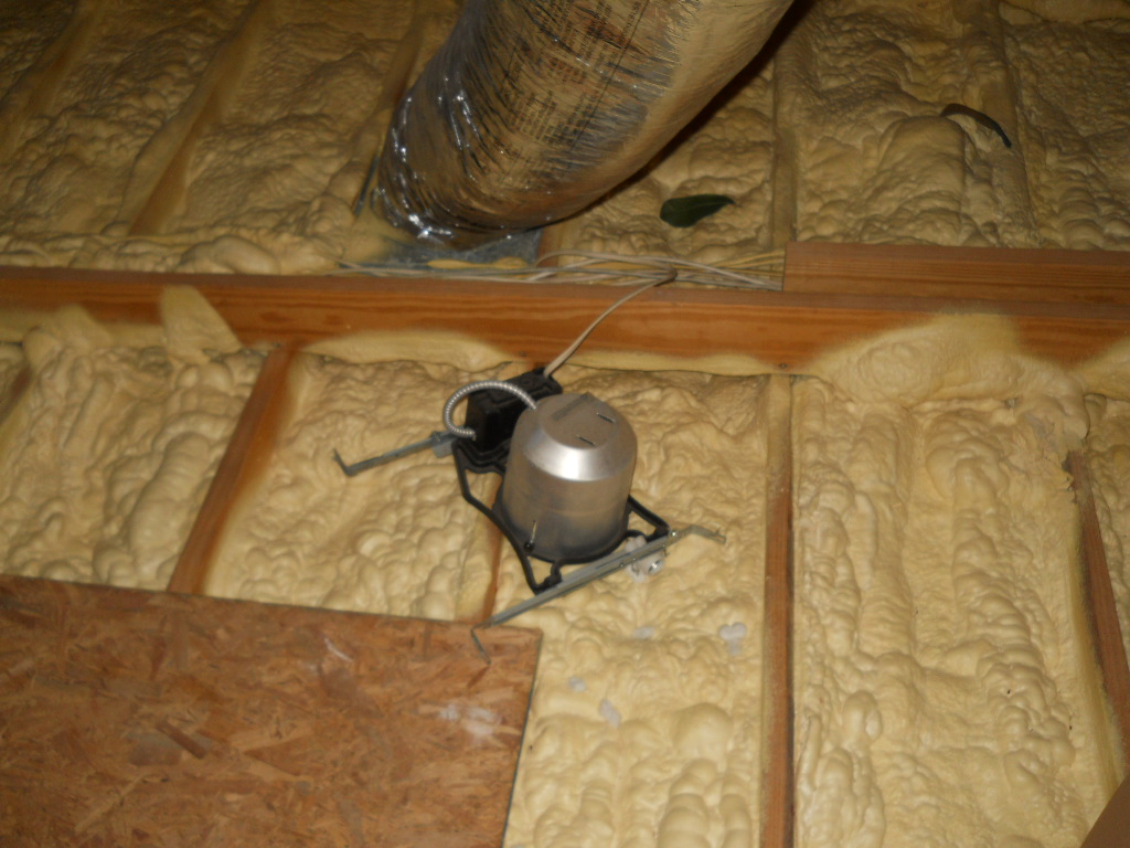 Spray foam insulation viewed in an attic during a home inspection