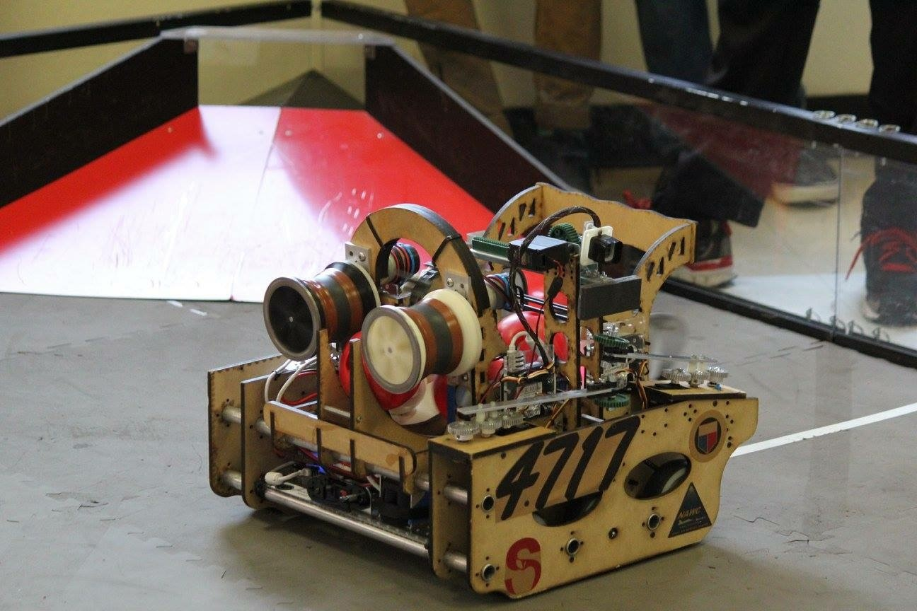 A photograph of Timbur the robot in action during a competition