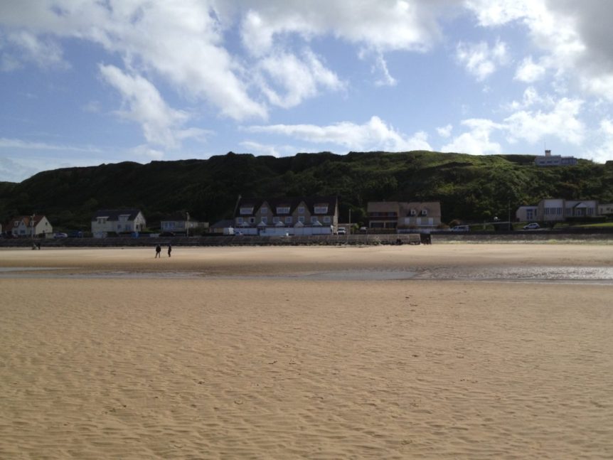 Omaha beach as seen from water's edge at low tide 