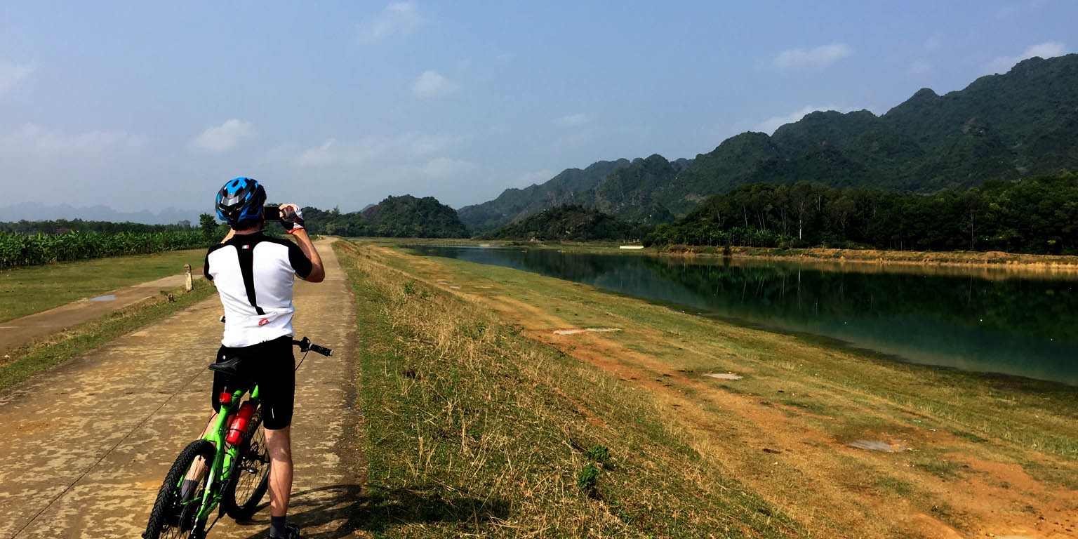 Experience Biking and Enjoy the Amazing View of the Karst and Rice Field