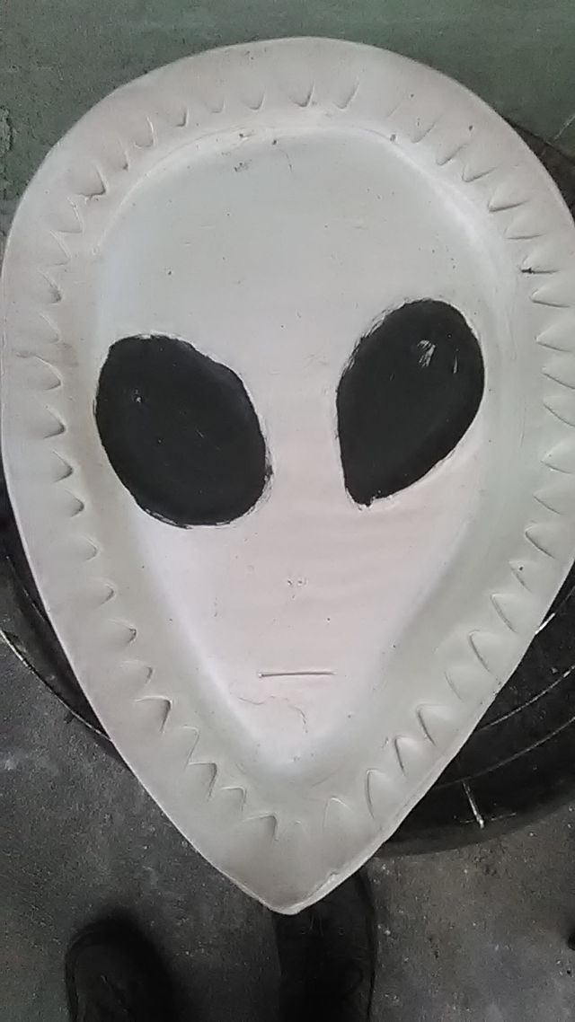 image: Alien Terracotta plate. 1foot by 2 feet(varies from top to bottom