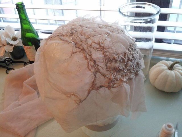 image: In-progres hand-stitched head adornment. 2014
