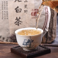 2010 Ding Ye "Lao Bai Cha" Aged Bai Mu Dan White Tea Cake from Yunnan Sourcing