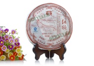 2007 Menghai "Adorned in Red" Sheng from Menhai Dayi (Berylleb on Ebay)