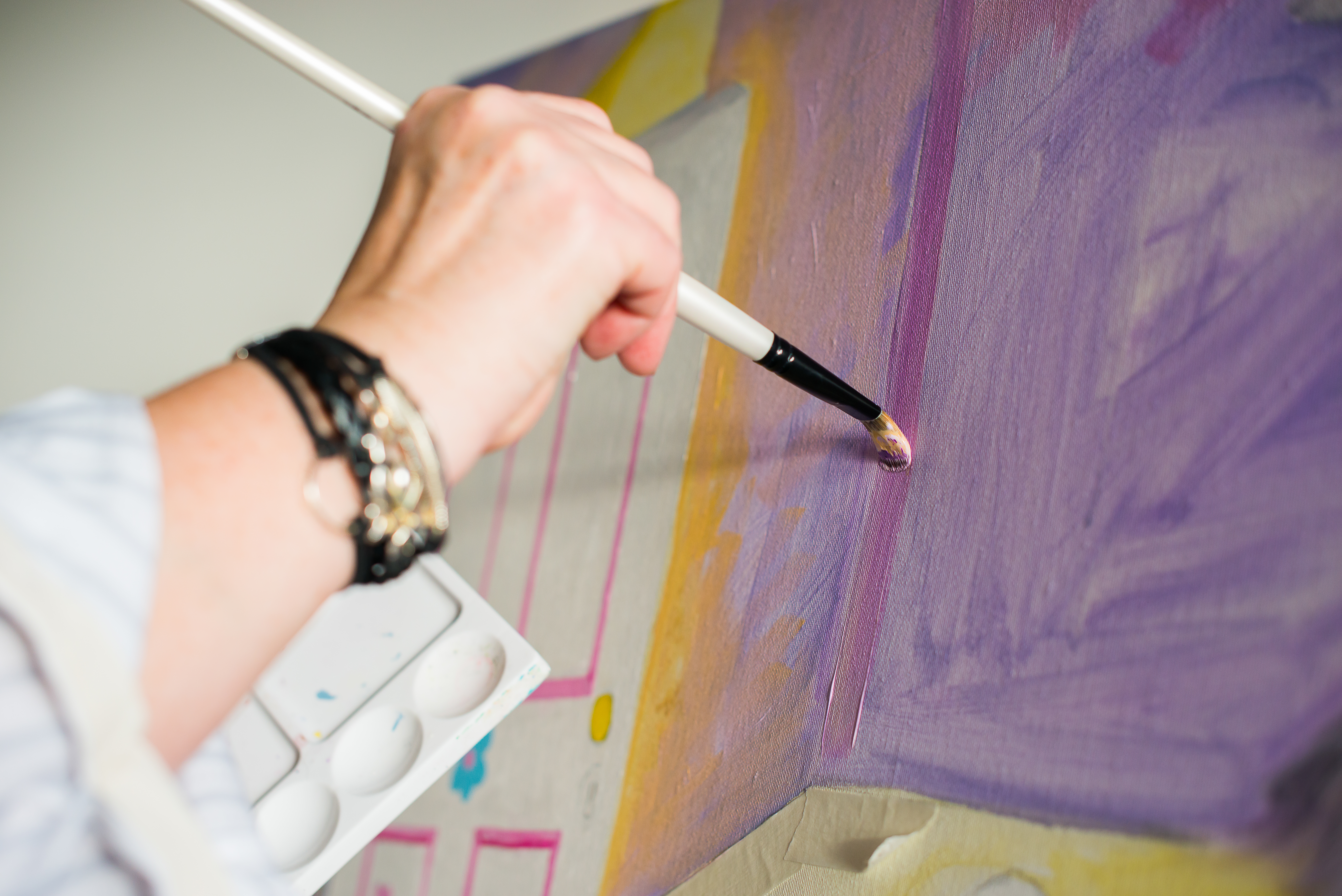 picture of an artists hand painting