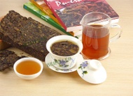 2005 Yunnan Menghai Dayi Tight Brick Tea Raw Pu’er Tea from Menghai Tea Factory (berylleb on ebay)