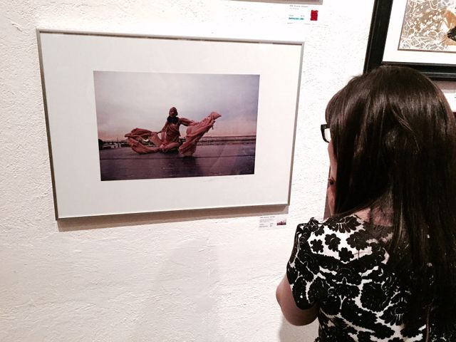 image: Eva Piatek checking out my piece during Saturday nights auction.