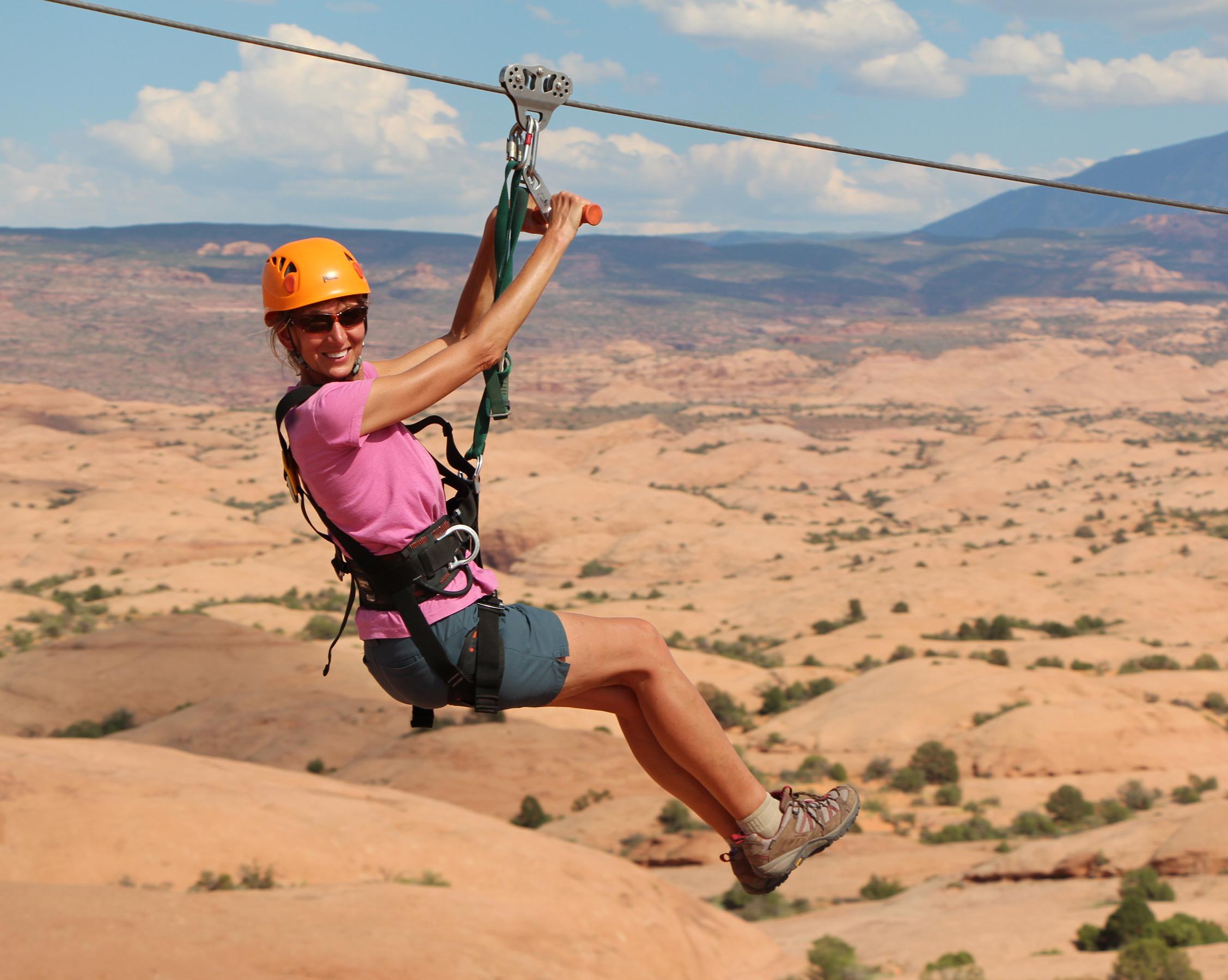 Experience the thrill of soaring through the Utah skies on the Zipline Adventure offered by Canyonlands by Night and Day in Moab. This private tour combines adrenaline-pumping zipline crossings with breathtaking views of the red rock landscape, making it perfect for adventure seekers and nature lovers alike. As you glide from platform to platform, you'll enjoy a unique perspective of the expansive canyon scenery, illuminated during sunset or under a starry night sky if you opt for an evening session. The guides prioritize safety while ensuring a fun, memorable experience, making it suitable for first-timers and seasoned adventurers. The tour also includes insightful commentary on the area's geological formations and history, enriching your outdoor adventure. Whether you're celebrating a special occasion or simply craving an exciting outdoor activity, this zipline adventure promises a blend of natural beauty and heart-pumping fun that you'll remember long after your trip ends. - Moab