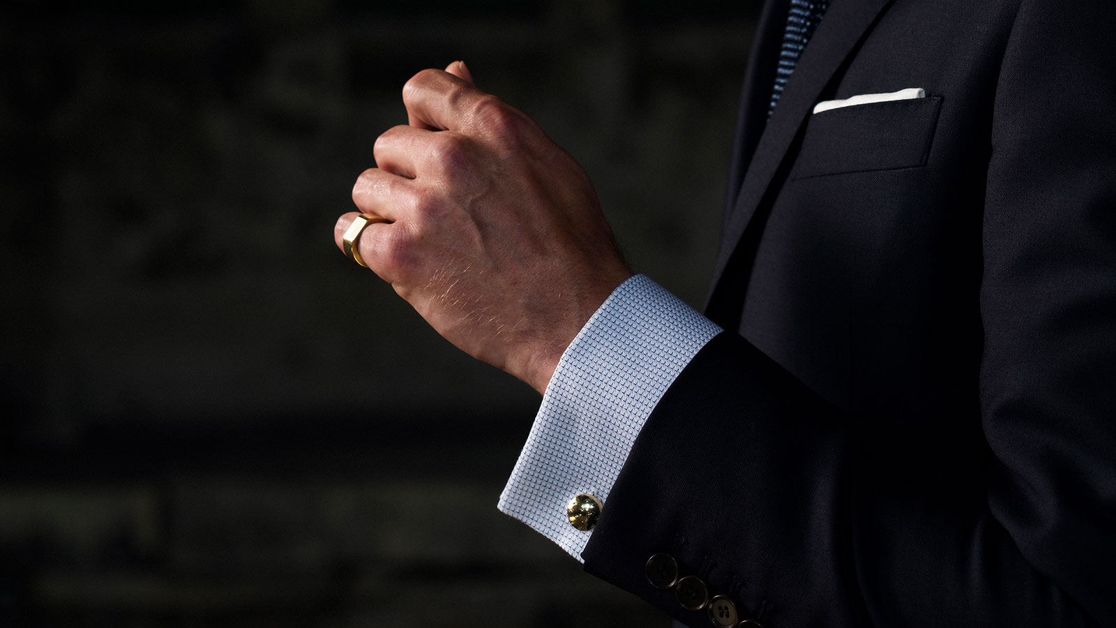 men wearing love bracelet