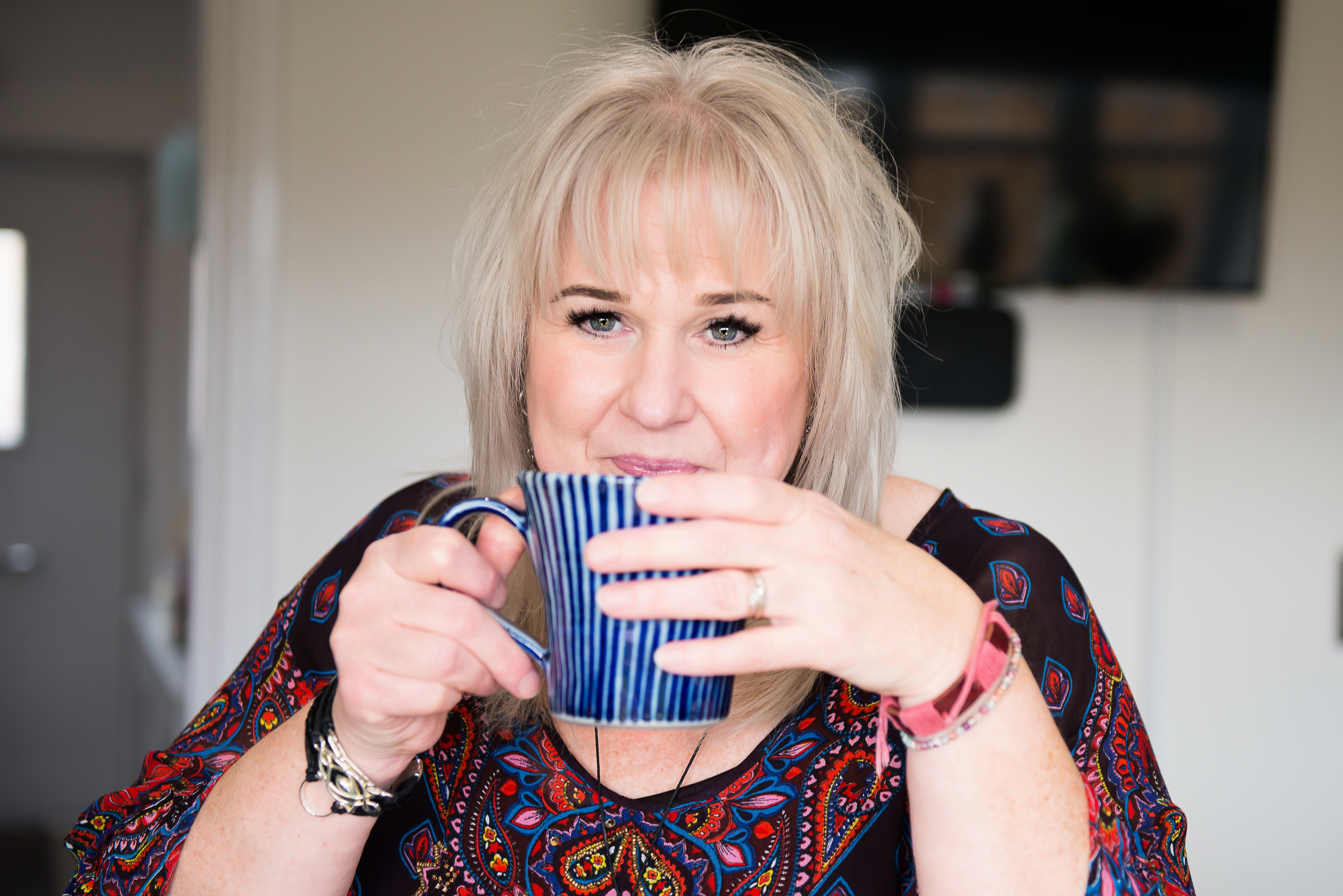 picture of a woman drinking a cup of tea