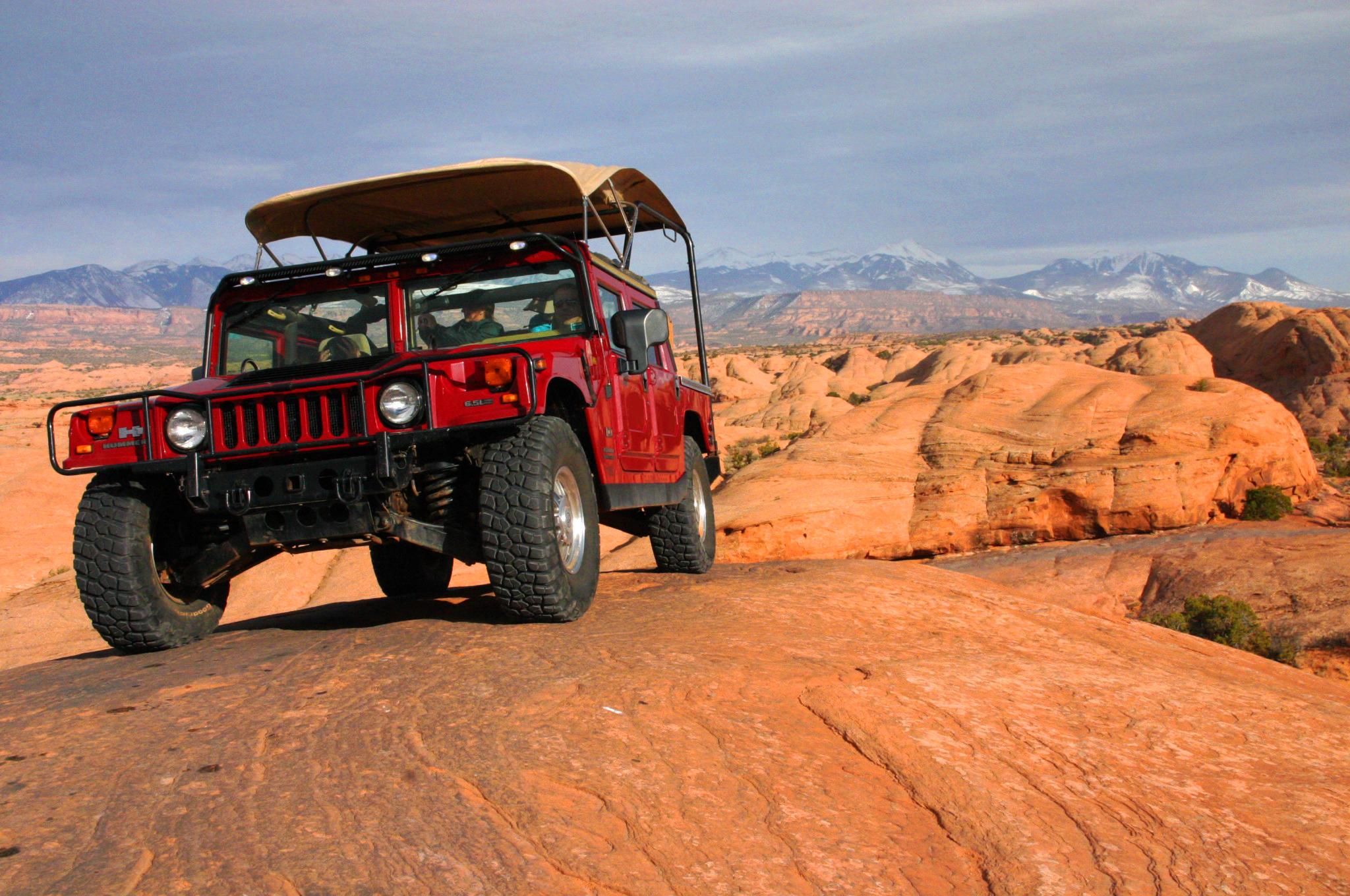 Embark on an exhilarating 4-Hour Hummer Tour with Canyonlands by Night and Day in Moab, Utah. This guided adventure offers an adrenaline-packed journey across rugged desert landscapes, unique rock formations, and scenic vistas you'll never forget. Perfect for thrill-seekers and nature lovers alike, the tour combines off-road excitement with awe-inspiring views of the iconic arches and mesas that define the region. As you cruise over challenging terrains, your guide shares fascinating insights into the area's geology, history, and the incredible wildlife that inhabits this desert paradise. The Hummer's powerful engine and durable build make it ideal for exploring the diverse landscapes without sacrificing comfort or safety. Whether you're visiting Utah for the first time or seeking a new adventure during your stay, this tour promises unforgettable moments and photo opportunities at every turn. Suitable for most fitness levels, it's a great way to experience the rugged beauty of Moab with expert guidance. Pack your sense of adventure and prepare for a memorable ride deep into the heart of Utah's stunning wilderness. - Salt Lake City